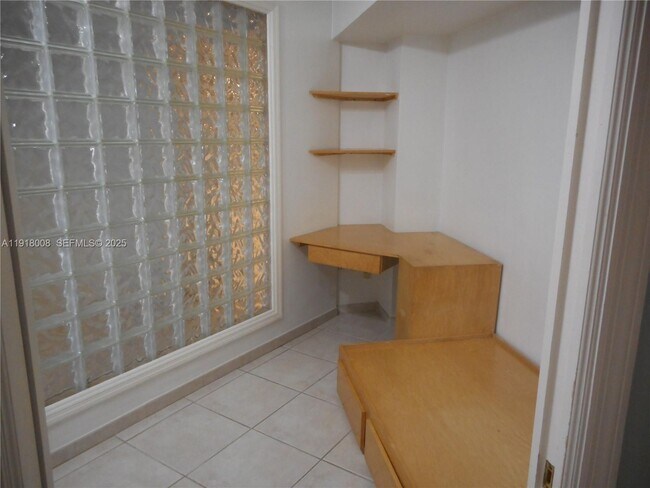 Building Photo - 10185 Collins Ave