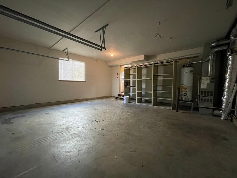 Large 2 car garage w/ storage shelving - 3016 Pacific St.
