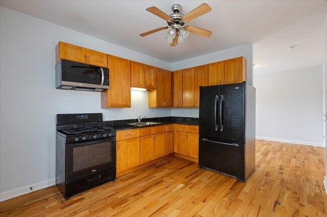 Building Photo - 1234 W 49th Pl