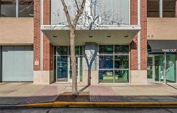 Building Photo - 2BR/2BA Skylofts Condo with Balcony & Garage Parking