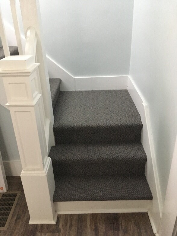 Stairs to 2nd floor in entry - 240 Highland Ave