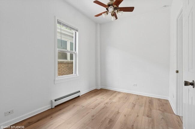 Building Photo - 5104 N Austin Ave