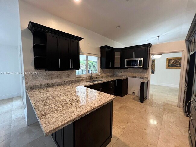 Building Photo - Southwest 143rd Place, Miami, FL 33175 - 4...