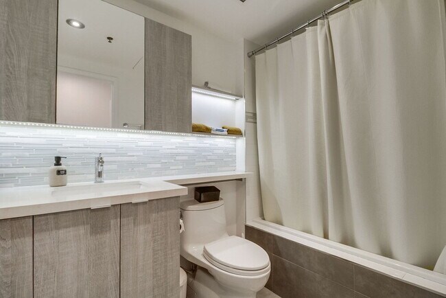 Building Photo - Penthouse Living in Charming Little Italy