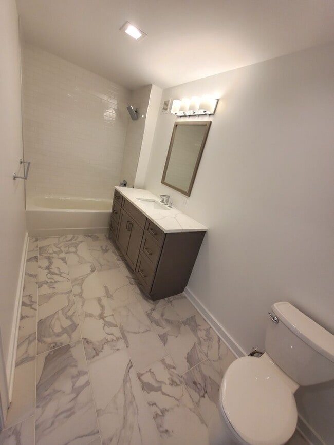Building Photo - Renovated, centrally located and with lots...
