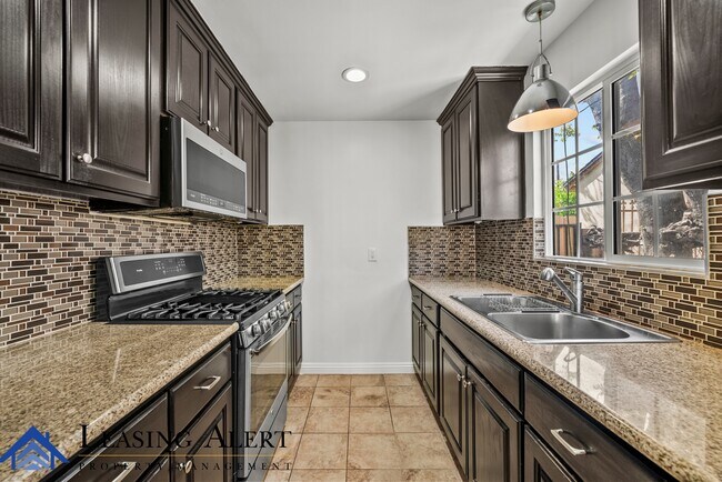 Building Photo - 7800 Lindley Ave