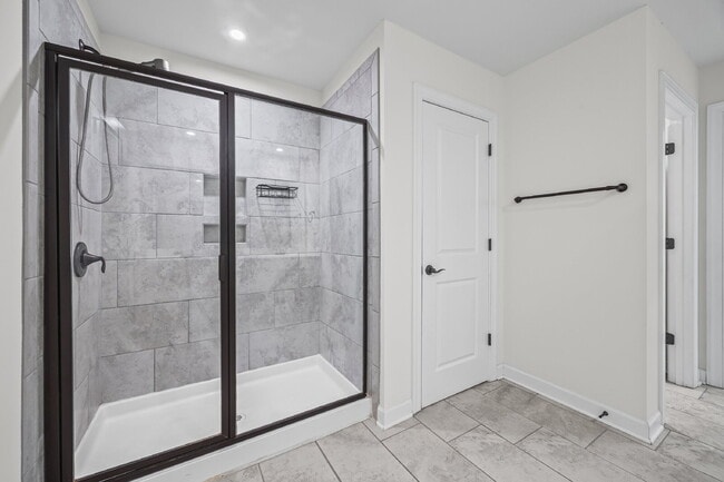 Building Photo - Classic finishes paired with an open, versatile layout!