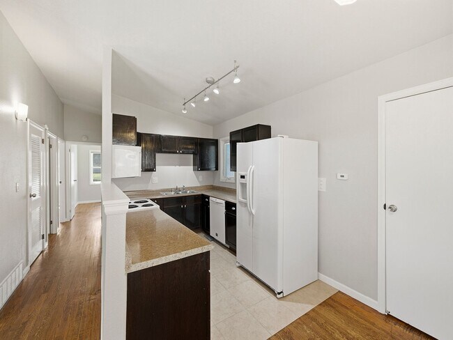 Building Photo - Updated 3 Bed Home with Vaulted Ceilings, Solar Panels & Large Corner Lot
