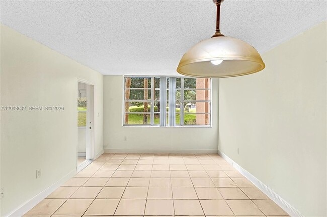 Building Photo - 9410 Tangerine Pl