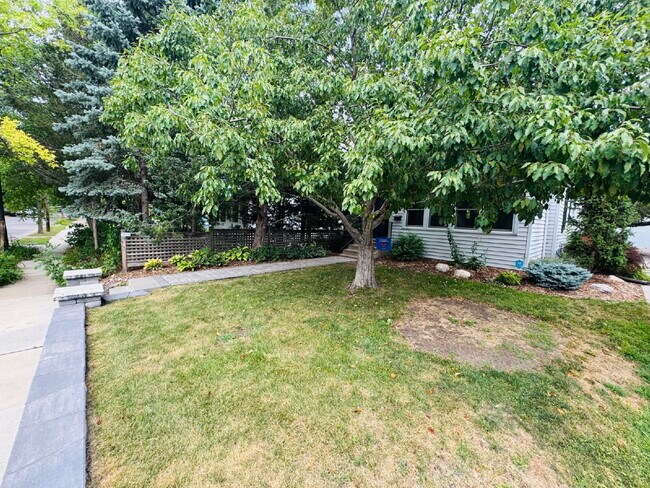 Building Photo - Charming 3-Bedroom Oasis with Elegant Touches & Finished Basement on Washburn Ave!