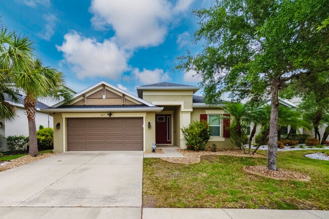 Building Photo - 8811 Tropical Palm Dr