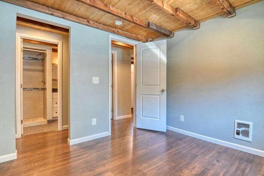 Bedroom space has a walk through closet which leads to the bathroom (door to left) - 431 N Franklin St