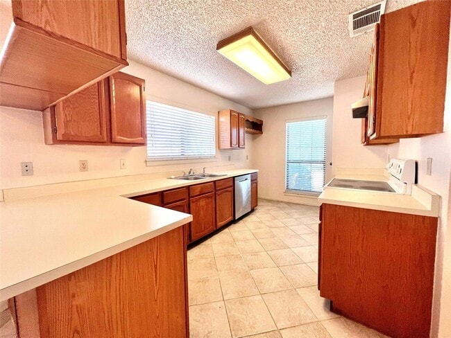 Building Photo - Beautiful 3-Bedroom Home with Bonus Back House in Lewisville — Free 50" TV Upon Move-In!