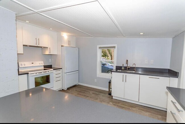 Building Photo - *Available For Immediate Move In - Lawn Ca...