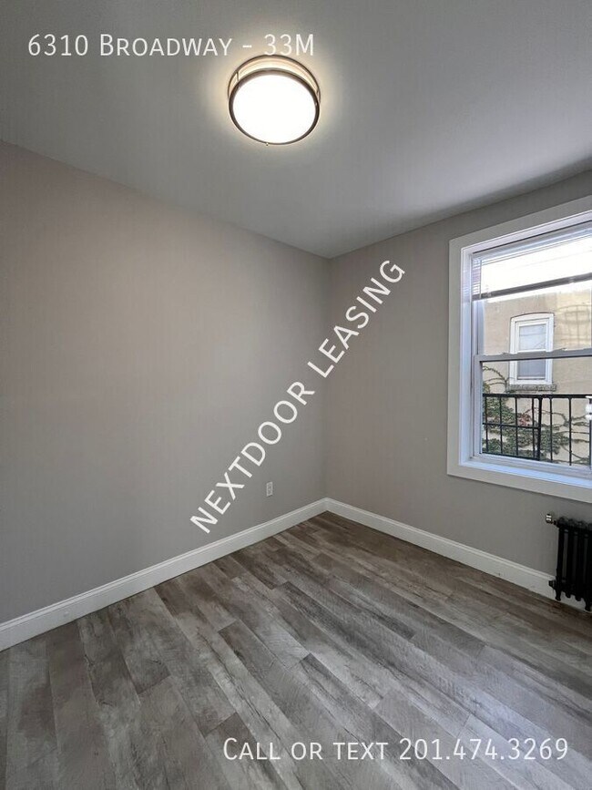 Building Photo - 6310 Broadway-33M