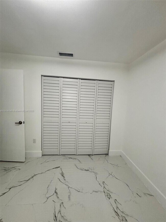 Building Photo - 1301 W 38th Pl