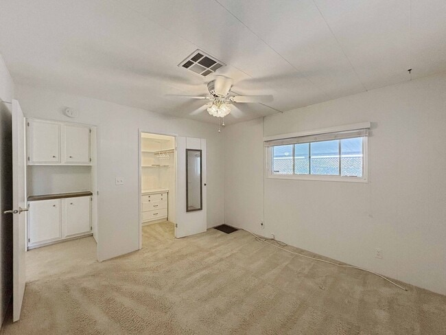 Building Photo - Spacious 2BR/2BA Home for Rent in 55+ Comm...