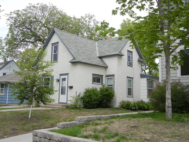Building Photo - Charming 4-Bedroom Minneapolis Home with Finished Basement & Hardwood Floors