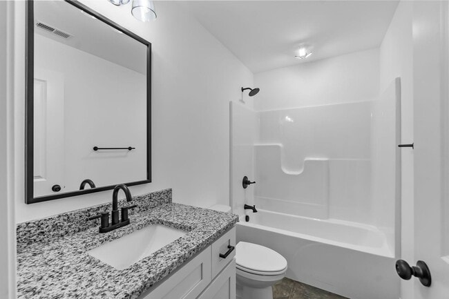 Building Photo - Custom-Built Metal Home with Modern, Energy-Efficient Design