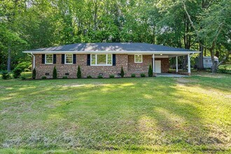 Building Photo - AVAILABLE NOW!! 4 bedroom Brick Ranch Styl...