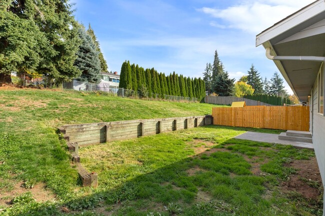 Building Photo - Recently updated 3 bdrm, 2 bath. Attached garage. Wrap around yard. Private upstairs bedroom and ...