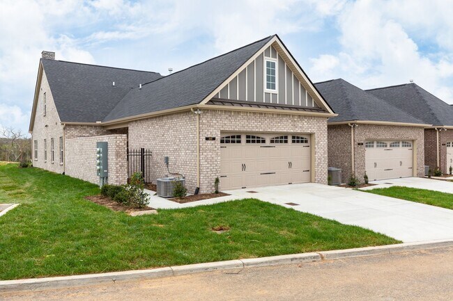 Building Photo - **BE THE LUCKY ONE TO LIVE IN THIS 2022-BUILT UPSCALE COTTAGE HOME IN THE PRESERVE AT BELLE POINTE**