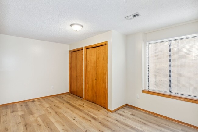 Building Photo - Derby Duplex with Fenced Yard!