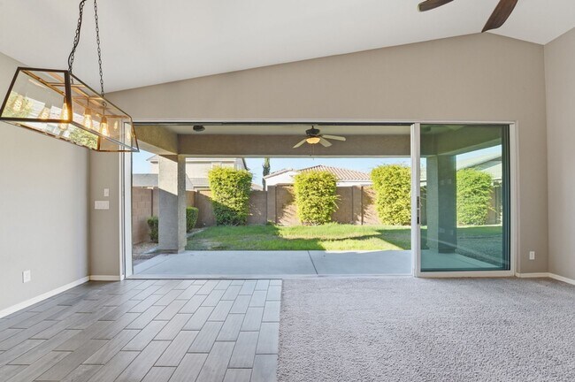 Building Photo - Stunning 4-Bed + Den Eastmark Home with Modern Upgrades Throughout