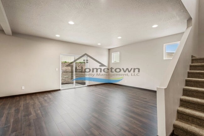 Building Photo - Woodbridge South Home with 4 Bedrooms and 3 Bathrooms in Post Falls build in 2021!