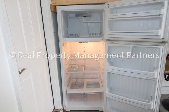 Building Photo - Spacious 3BR Townhome in Lowell | Nature Views & Maintenance-Free Living