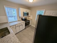 Building Photo - Take Aim at Fletcher - $1000 Security Deposit & 1/2 Off Your First Month!