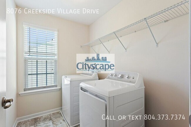 Building Photo - 8076 Creekside Village Dr