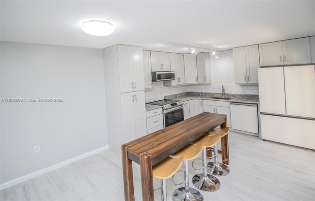 Building Photo - 1410 14th Terrace
