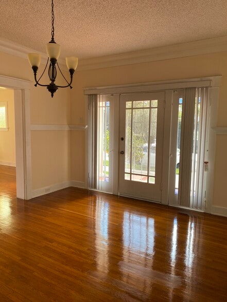 From dining room, door leads out to side porch - 301 Grand Ave