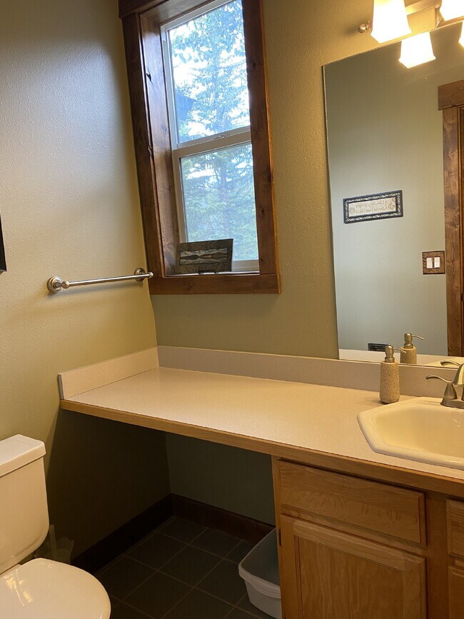 Building Photo - "Spacious 4-Bedroom Retreat with 3 Full Ba...