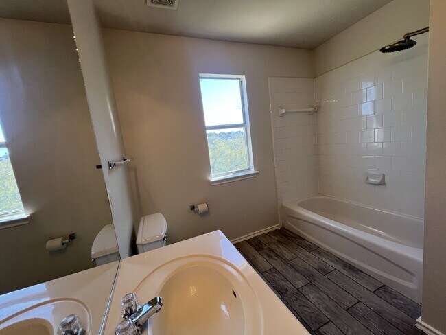 Building Photo - Charming 3-Bed /2 -Bath Sanctuary with Fireplace & Hardwood Floors, Between Evans and Bulverde at...