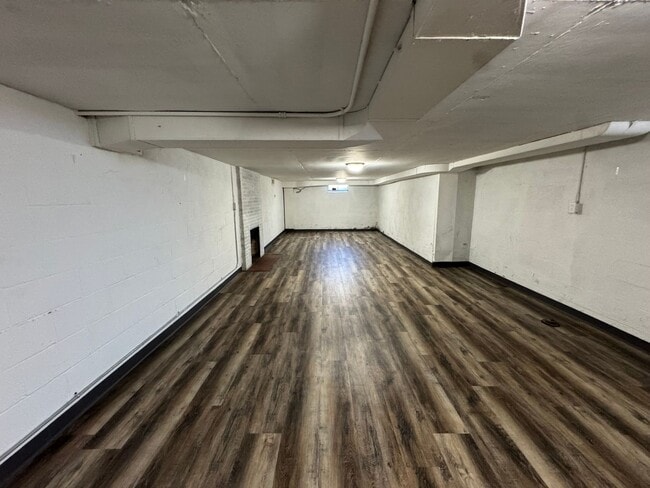 Building Photo - Large Moline Home with 3-Car Garage, Privacy, and Plenty of Space