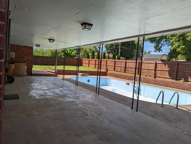 Covered Patio, Privacy Fence. 10 ft deep inground Pool - 302 Mitchell Ave