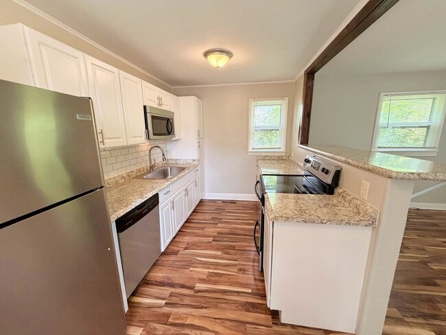 Building Photo - Move-In Ready 3BR Rental with Spacious Yard & Deck