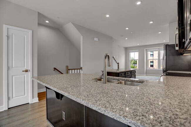 Building Photo - Luxury 4-Story Townhome with Rooftop Terrace!