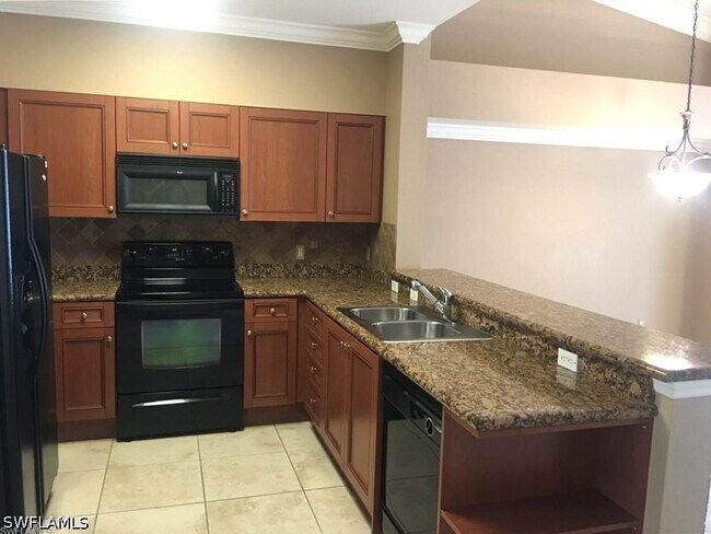 Building Photo - 10101 Villagio Palms Way