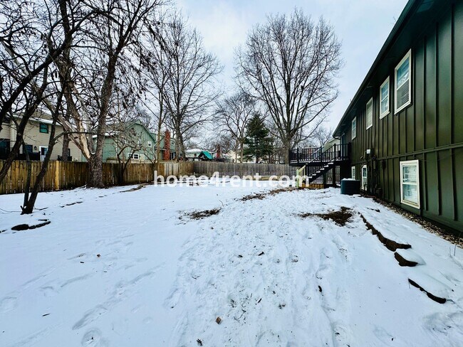 Building Photo - A Lovely Four Bedroom Home in Lenexa w/ Wood Floors, Finished Basement and a Fenced Yard!