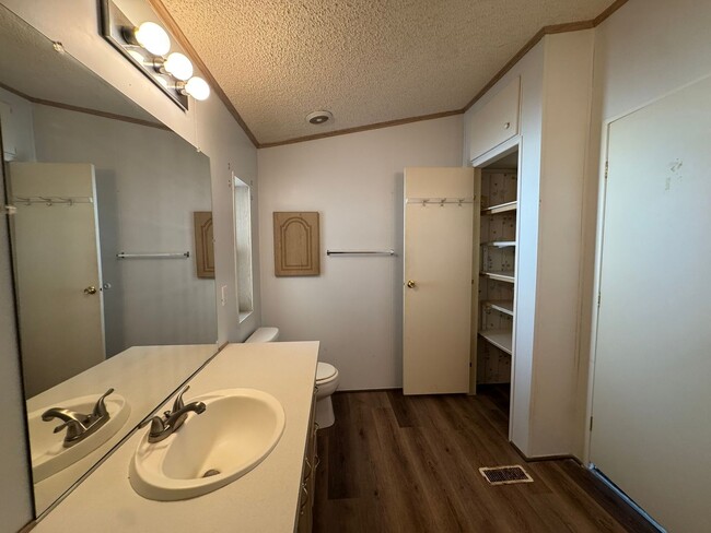 Building Photo - Sunrise Vista -2 Br, 2Ba home with covered carport, fenced yard, storage