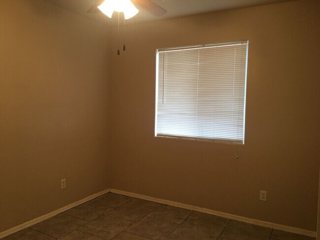 Building Photo - 3-Bedroom Single Family Home with Central Cooling, Attached Garage, and Tile Flooring