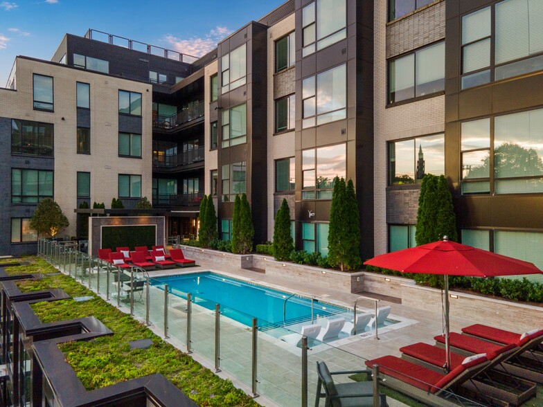 Elevated pool deck with cozy pool-side seating - Hanover 8th Street