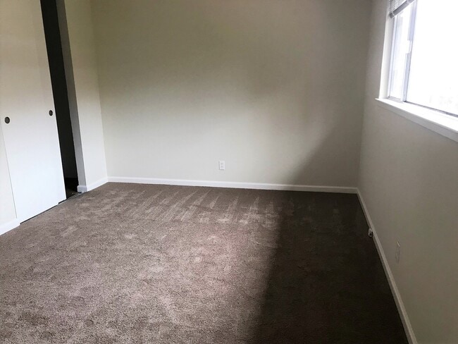 Building Photo - Home adjacent to park with new paint and n...