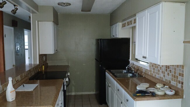 Kitchen east view - 211 Sandy Cir