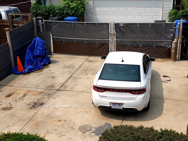 Rear parking area- fenced and gated. - 2516 W Lyndale St