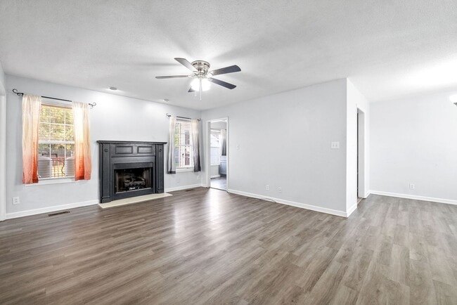 Building Photo - Adorable home with fenced back yard coming...