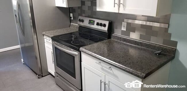 Building Photo - Available Now = 4 Bedroom 2 Bath Updated H...